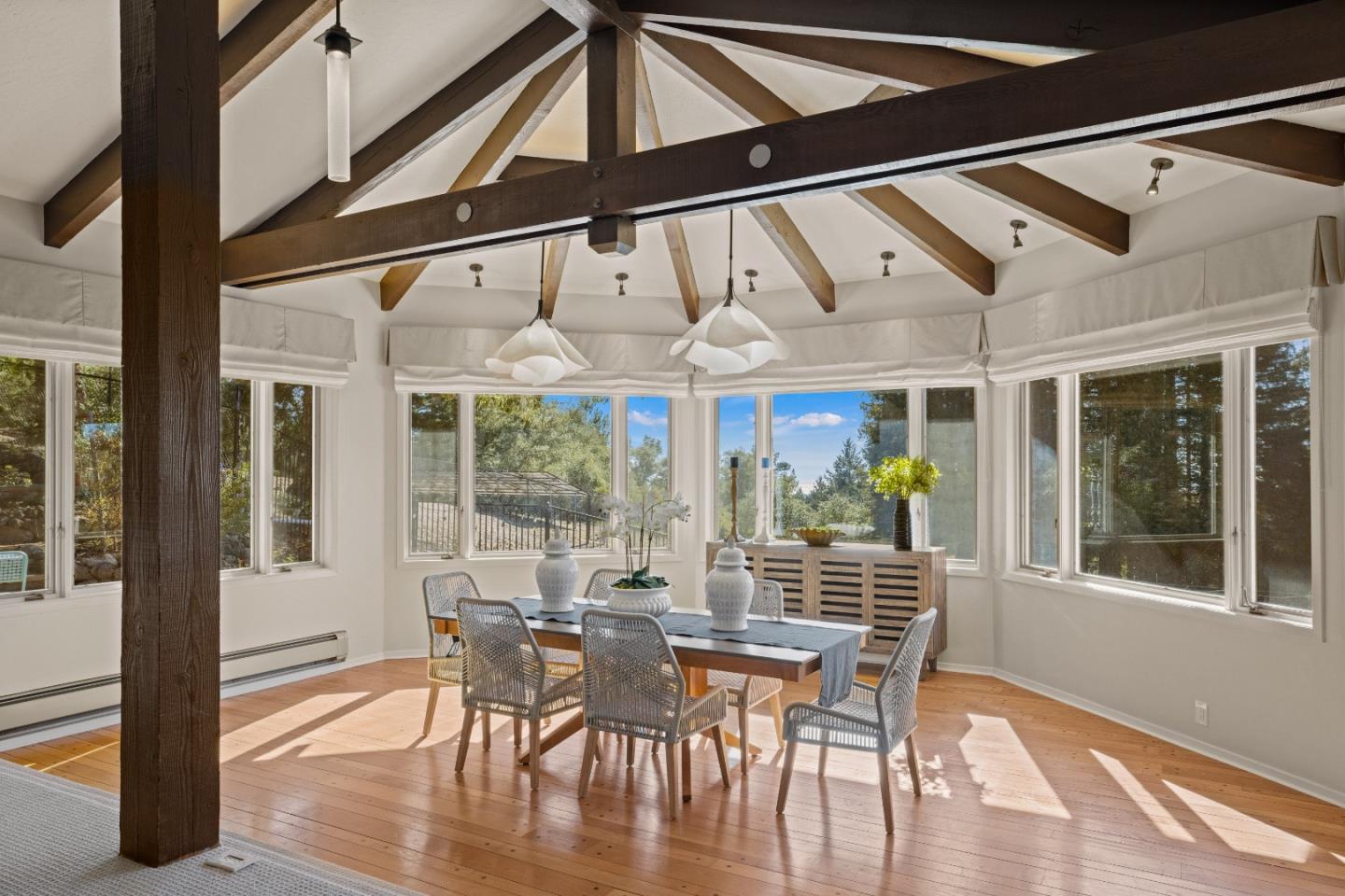 1390 Weston Ridge Road Scotts Valley, CA 95066 - Photo 5 of 55 a dining room with furniture large windows and wooden floor