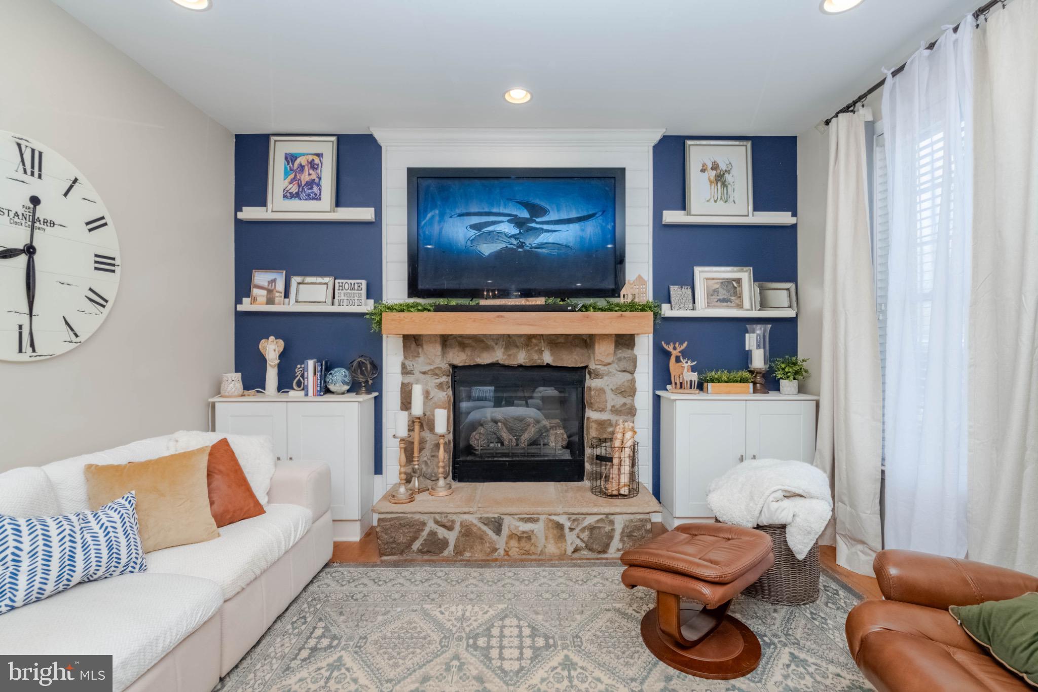 639 Old Orchard Road Bel Air, MD 21014 - Photo 13 of 46 a living room with furniture and a fireplace