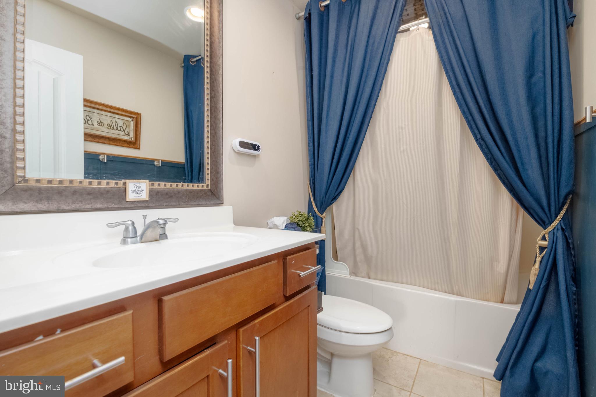 639 Old Orchard Road Bel Air, MD 21014 - Photo 26 of 46 a bathroom with a sink a toilet and shower
