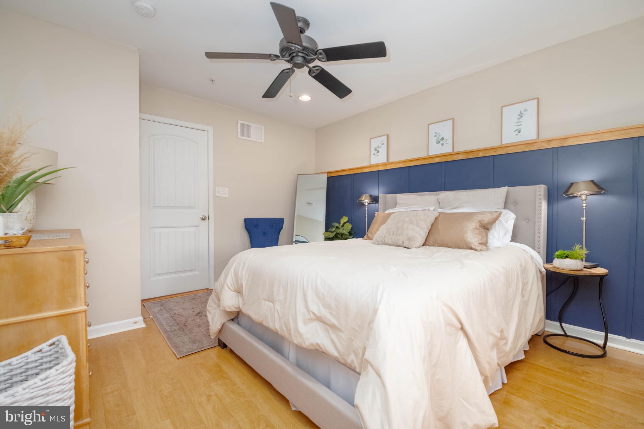 639 Old Orchard Road Bel Air, MD 21014 - Photo 29 of 46 a bedroom with a bed and wooden floor