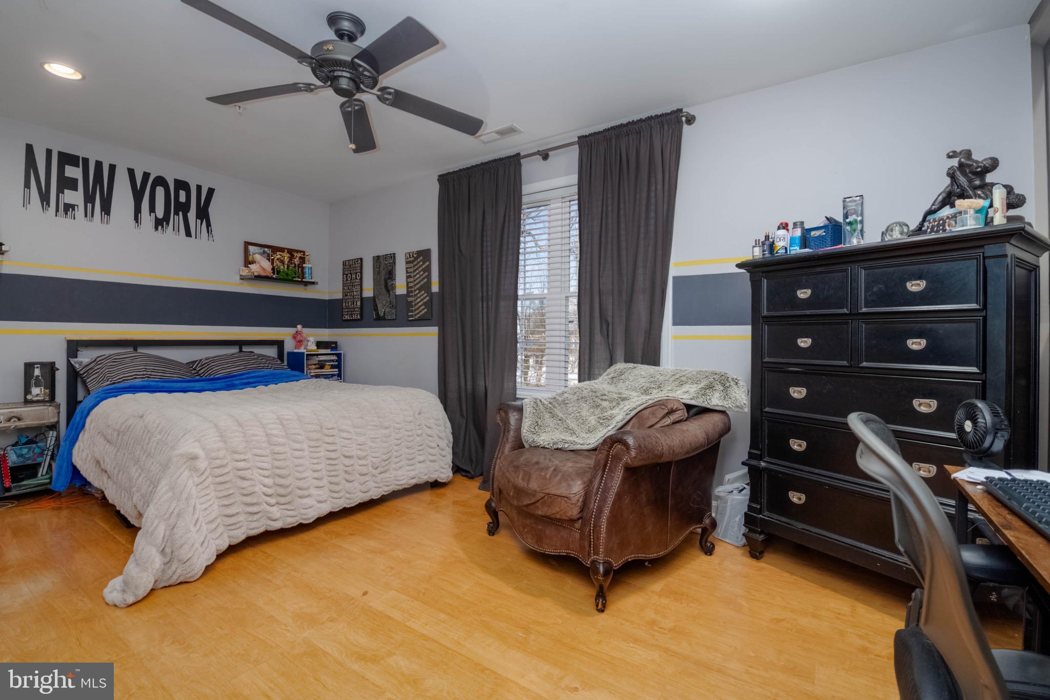 639 Old Orchard Road Bel Air, MD 21014 - Photo 30 of 46 a bedroom with a bed a computer on the desk and a dresser
