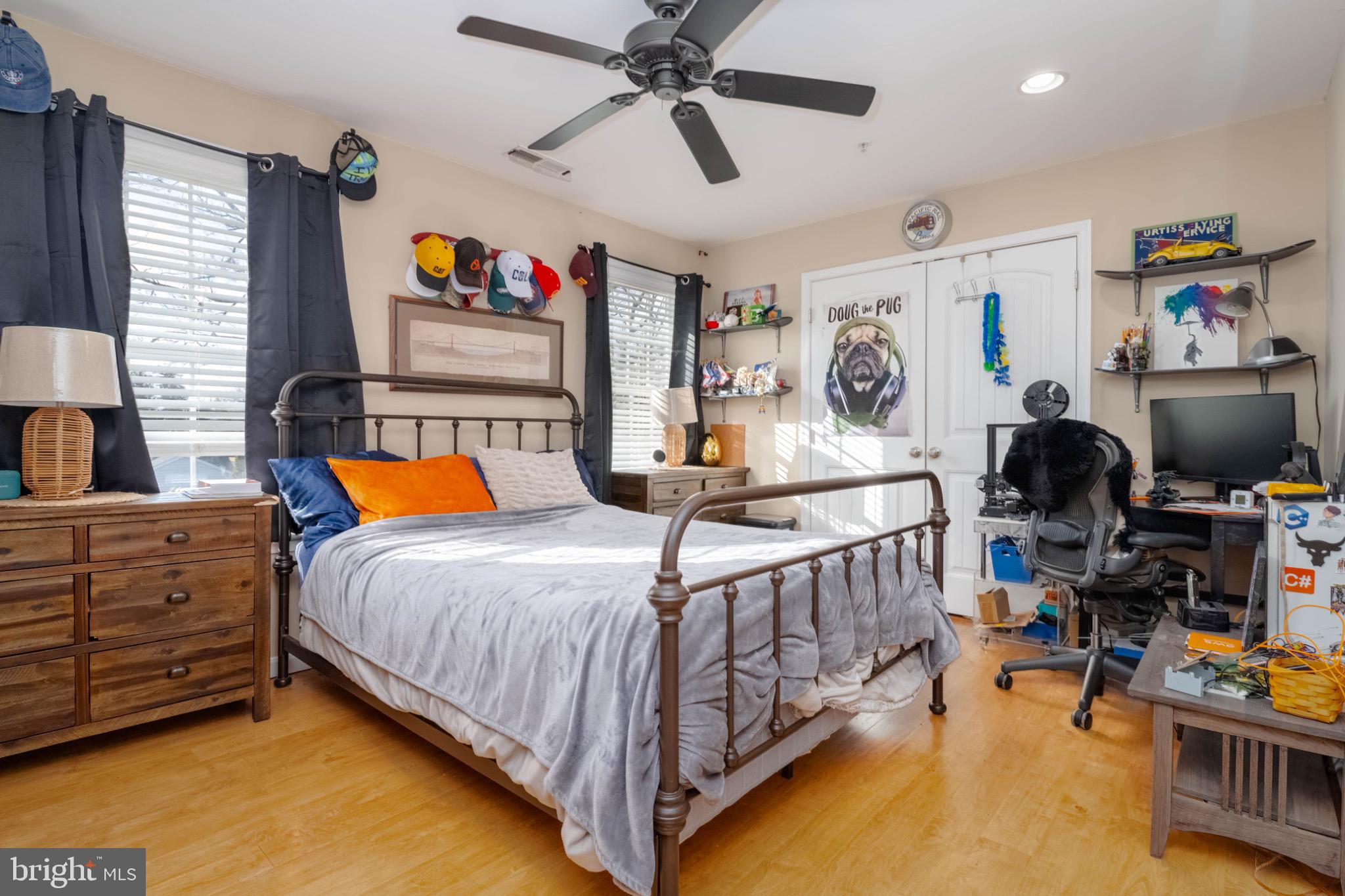 639 Old Orchard Road Bel Air, MD 21014 - Photo 32 of 46 a bedroom with bed and a chandelier