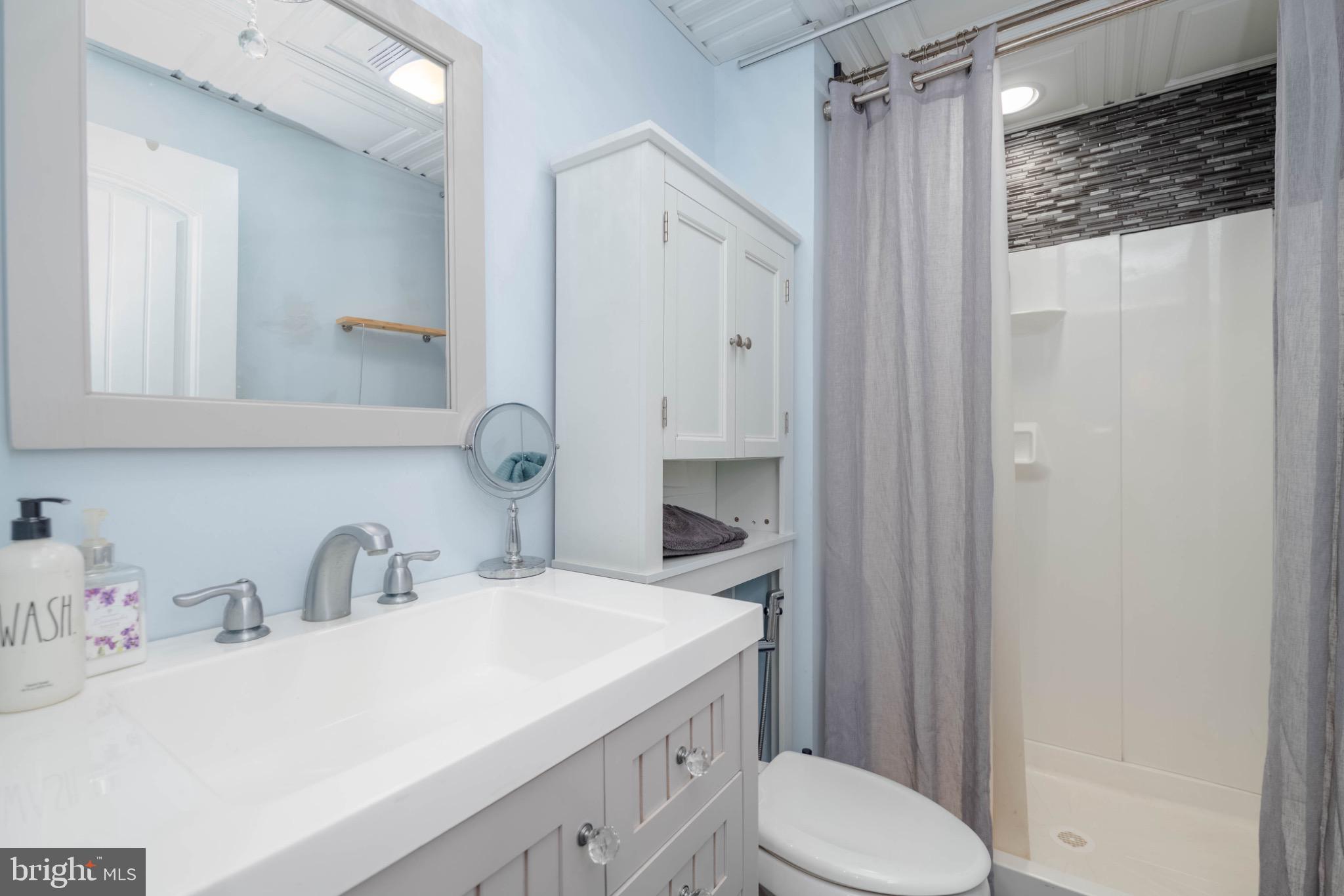 639 Old Orchard Road Bel Air, MD 21014 - Photo 33 of 46 a bathroom with a sink toilet and shower