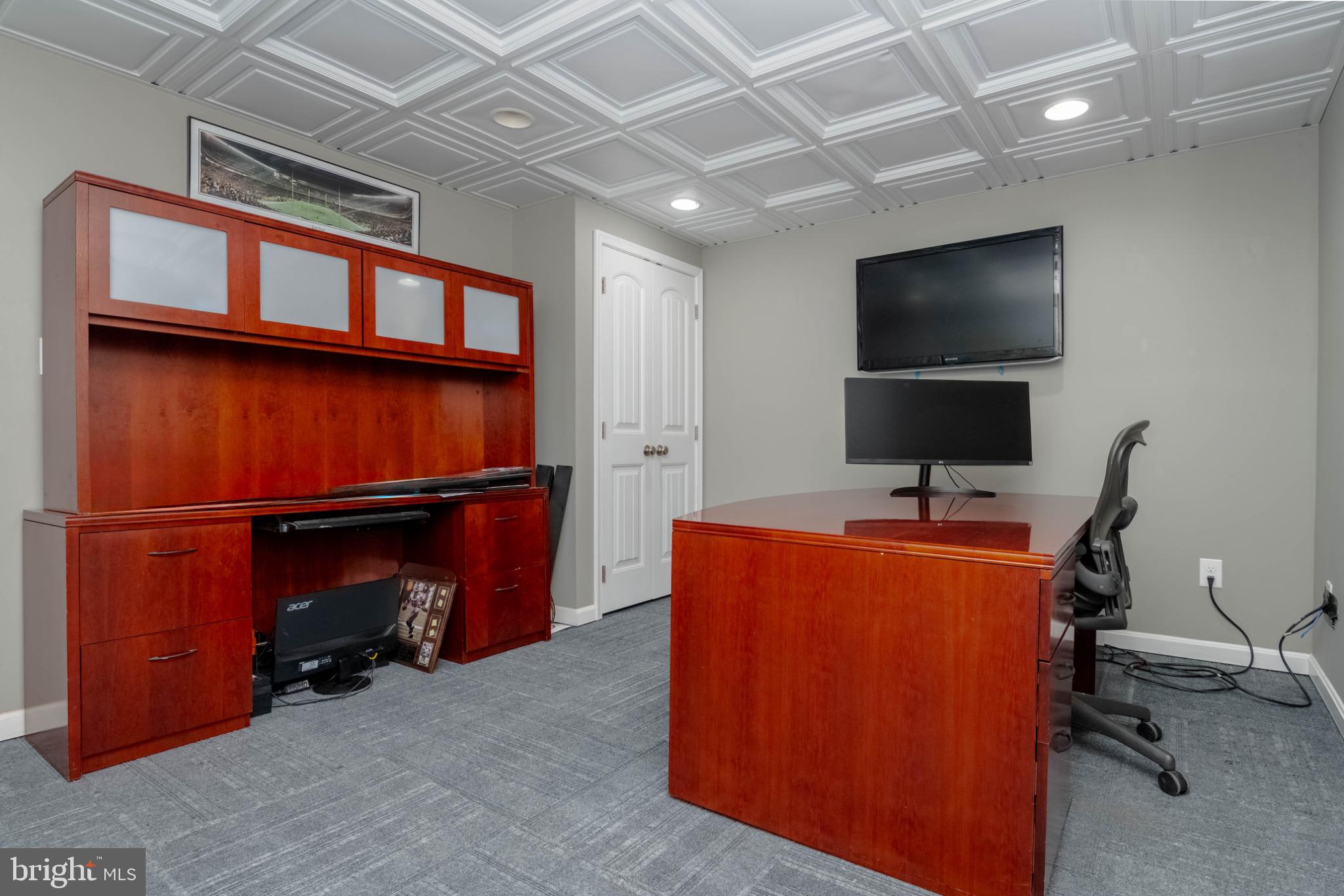 639 Old Orchard Road Bel Air, MD 21014 - Photo 35 of 46 a room with furniture and a flat screen tv