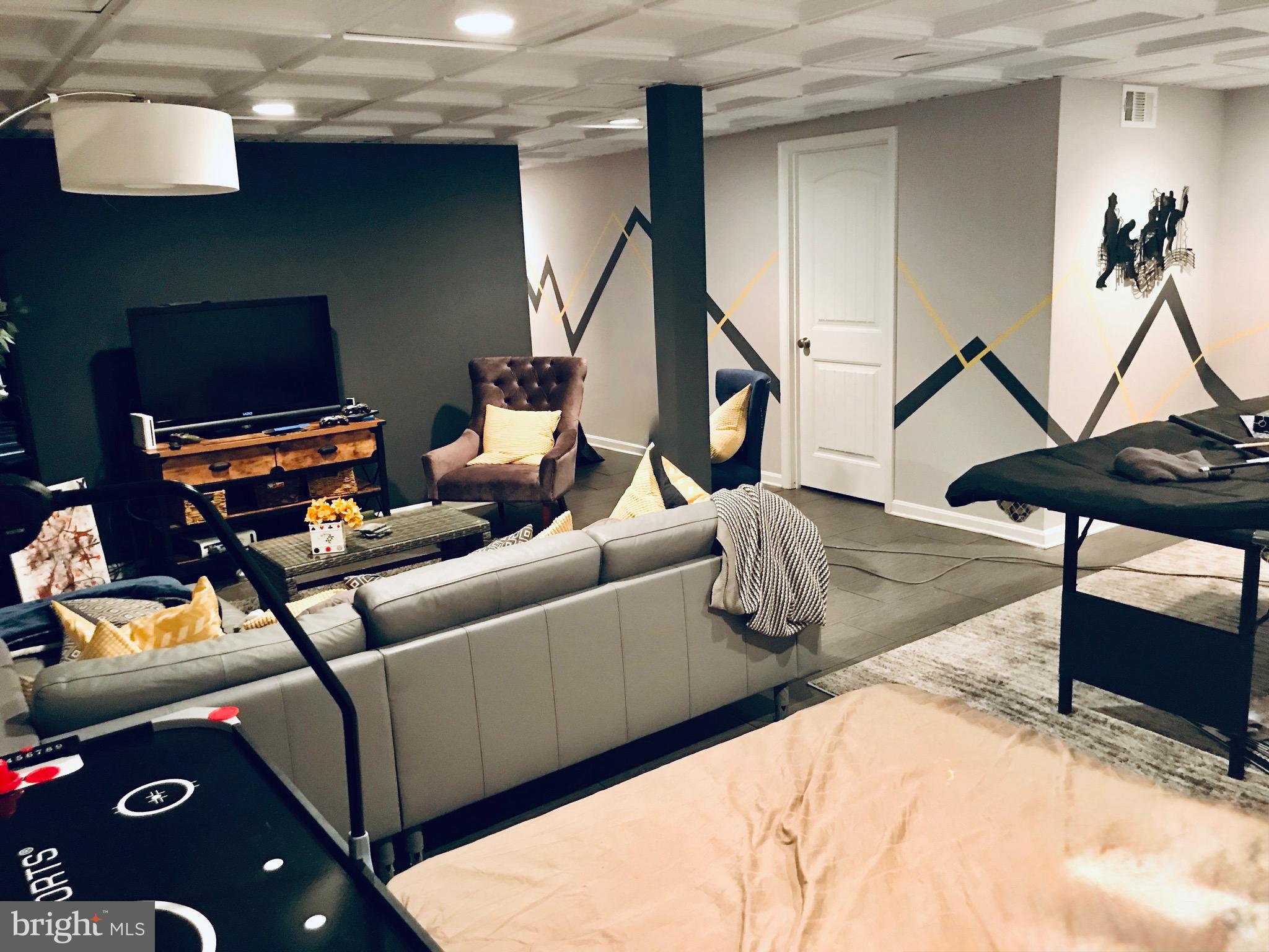 639 Old Orchard Road Bel Air, MD 21014 - Photo 36 of 46 a living room with furniture and a flat screen tv