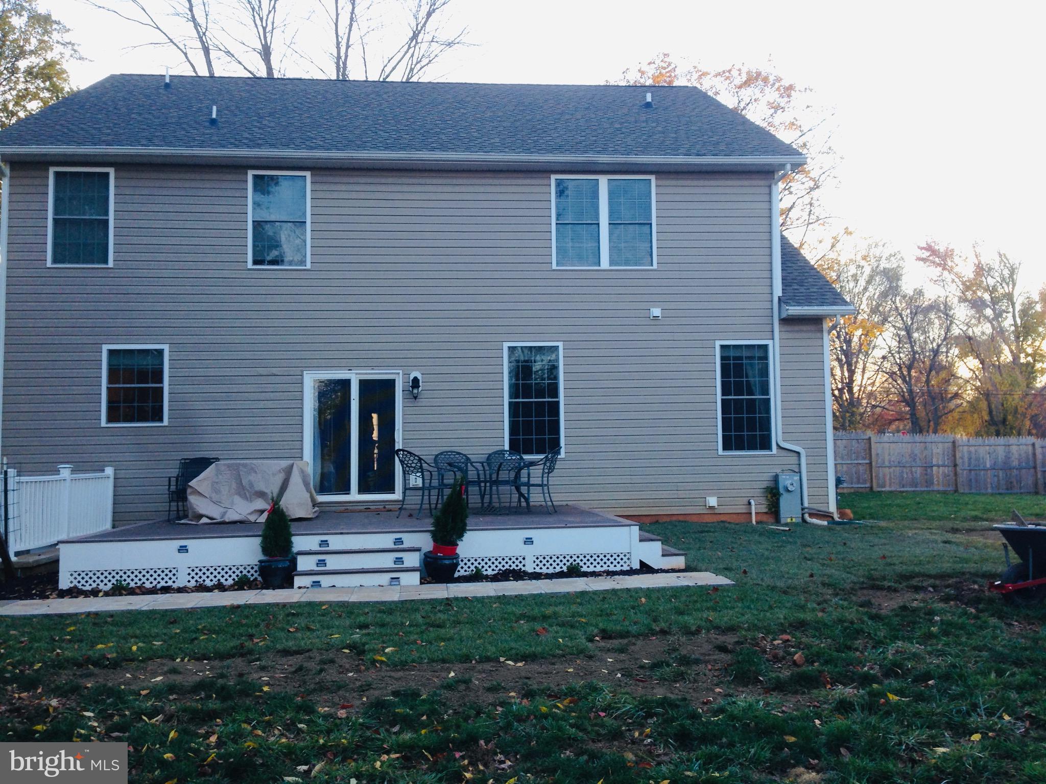 639 Old Orchard Road Bel Air, MD 21014 - Photo 37 of 46 a front view of a house with a garden and plants
