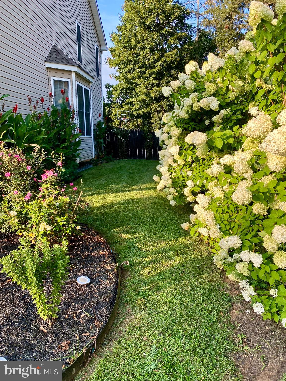 639 Old Orchard Road Bel Air, MD 21014 - Photo 41 of 46 a view of a house with a yard and garden