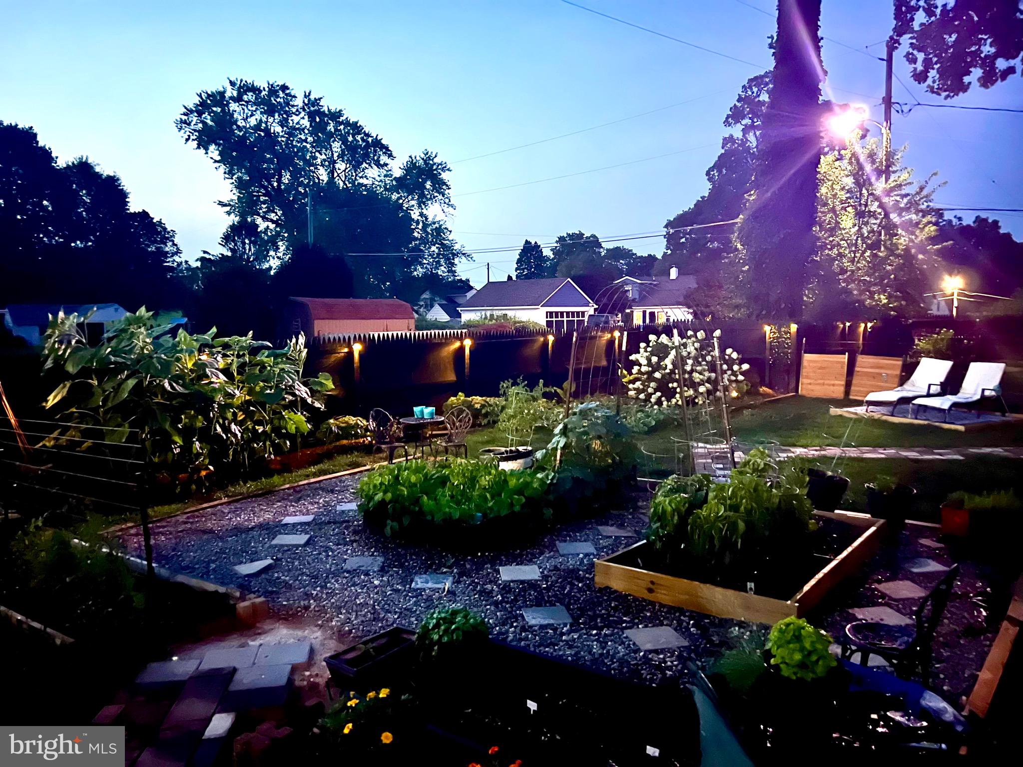 639 Old Orchard Road Bel Air, MD 21014 - Photo 42 of 46 a view of a garden with lots of flowers and trees