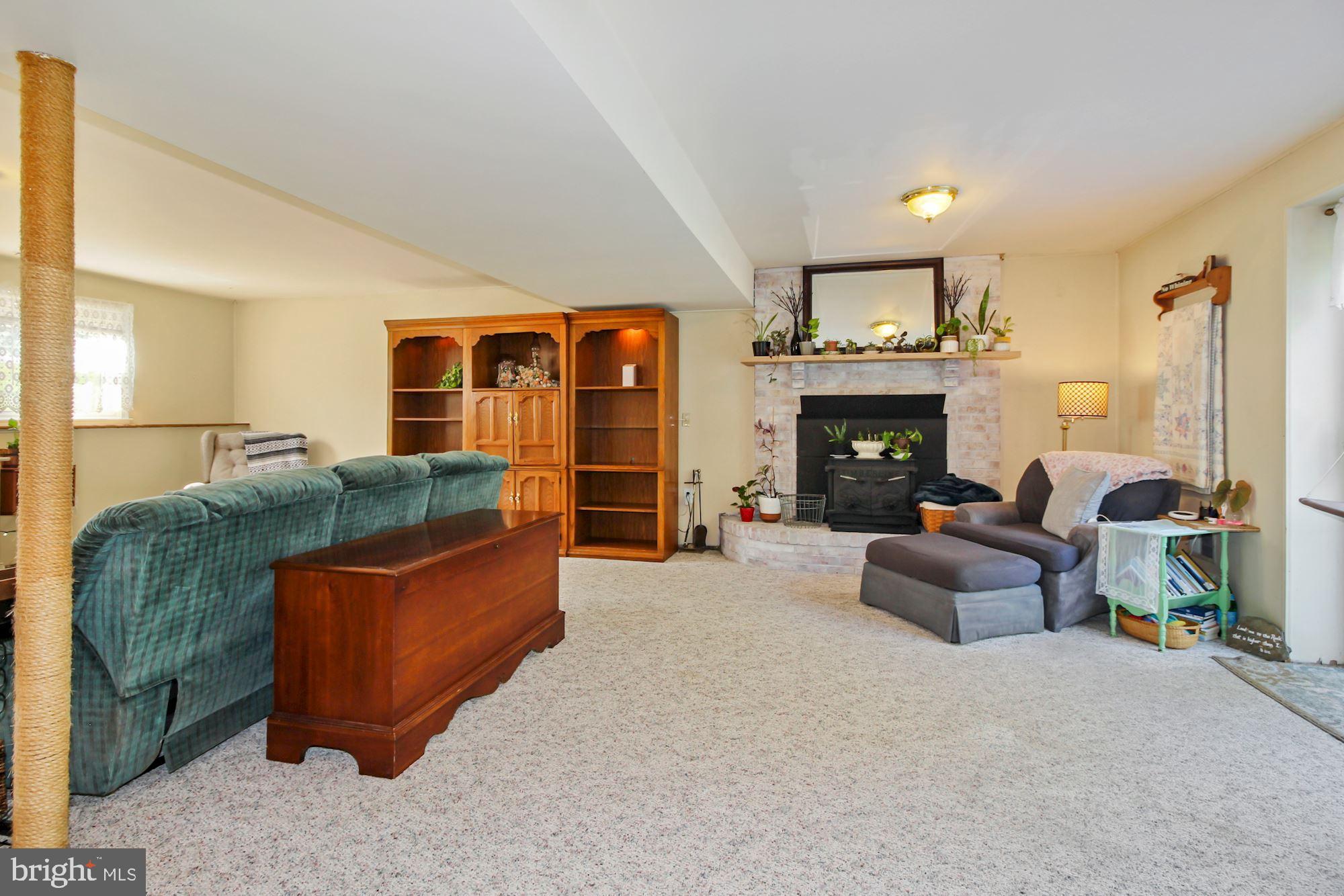 4141 London Bridge Road Finksburg, MD 21048 - Photo 19 of 31 Lower level family room with wood stove.