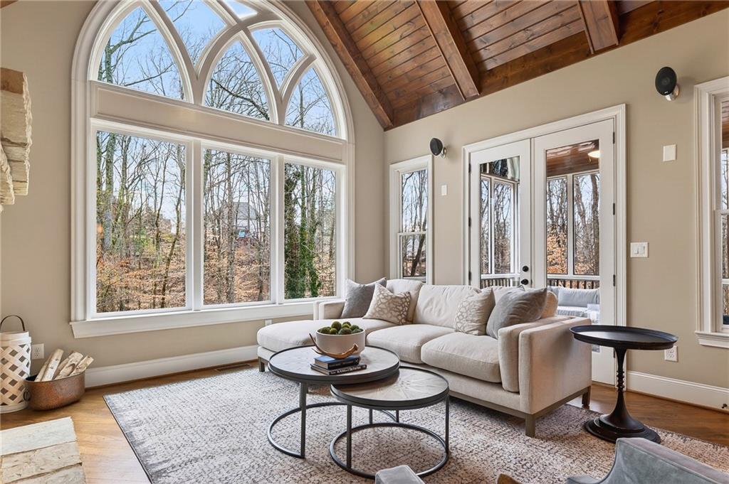 16750 Quayside Drive Milton, GA 30004 - Photo 12 of 53 a living room with furniture and a large window
