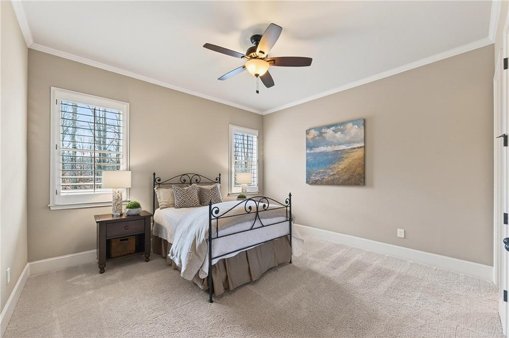 16750 Quayside Drive Milton, GA 30004 - Photo 15 of 53 a bed room with a bed and window