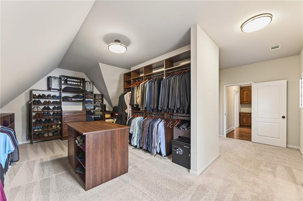 16750 Quayside Drive Milton, GA 30004 - Photo 22 of 53 a view of a walk in closet