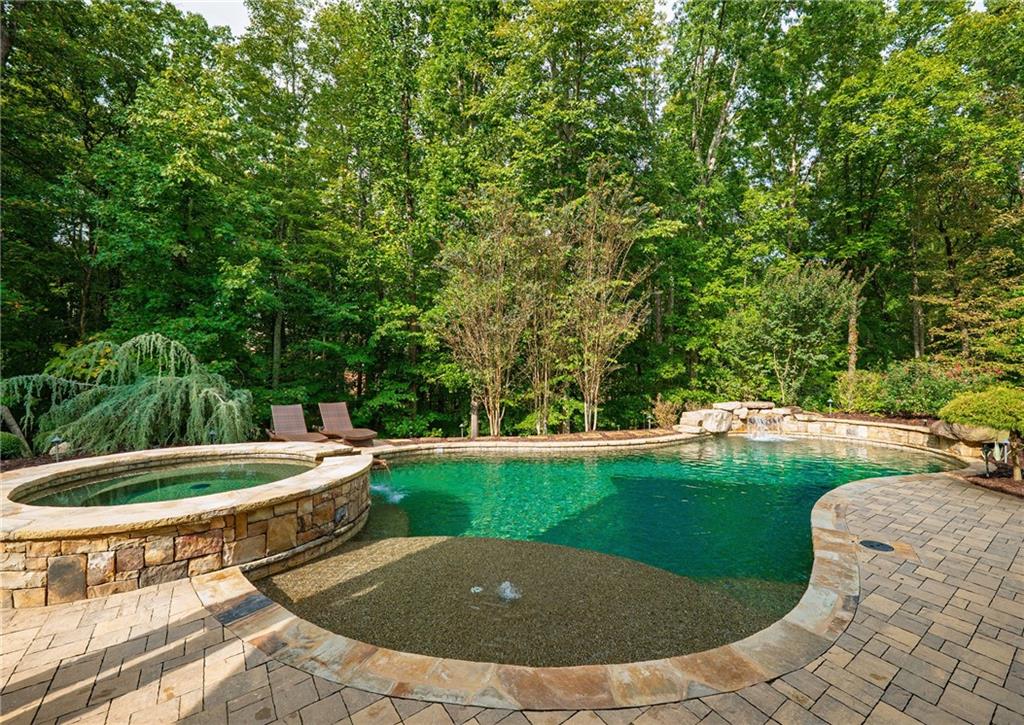 16750 Quayside Drive Milton, GA 30004 - Photo 40 of 53 a view of a backyard with swimming pool
