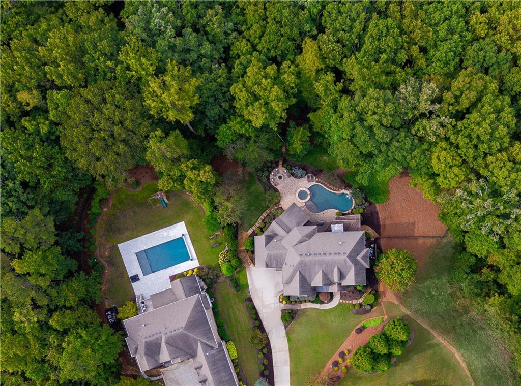 16750 Quayside Drive Milton, GA 30004 - Photo 44 of 53 an aerial view of a house with yard swimming pool and outdoor seating