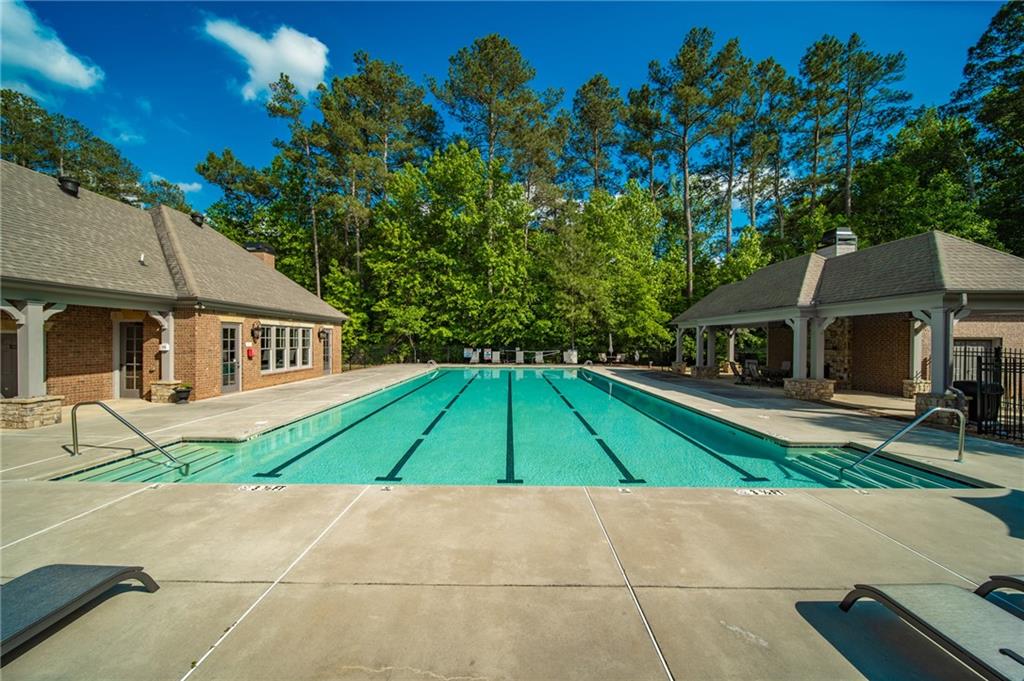 16750 Quayside Drive Milton, GA 30004 - Photo 46 of 53 a house with yard in front of it