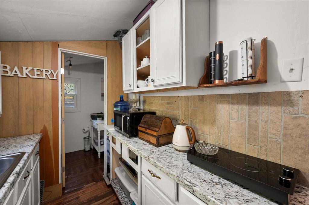 734 Interstate 45 Teague, TX 75860 - Photo 5 of 19 a kitchen with a stove and a sink