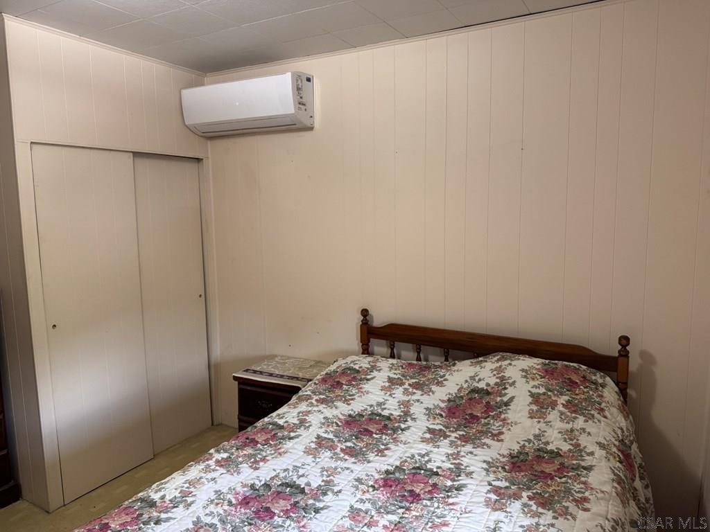 139 Reed Street Elmora, PA 15737 - Photo 16 of 23 a bedroom with a bed and a shower