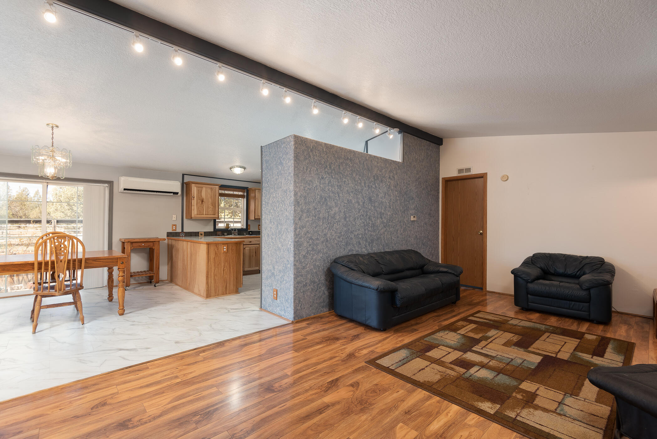 14638 Southwest Chickadee Road Terrebonne, OR 97760 - Photo 16 of 48 Living room to Kitchen and Dining Room