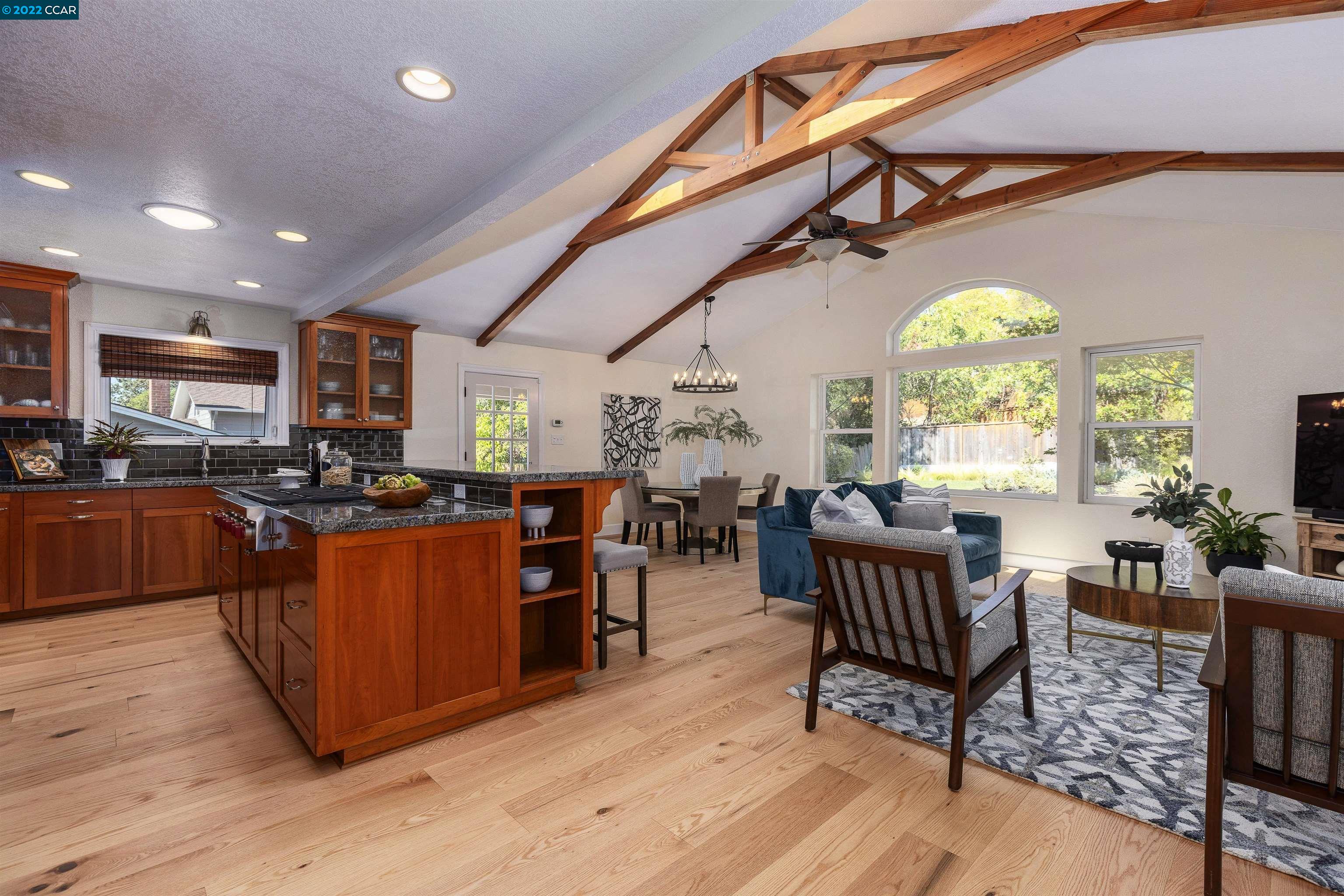 372 Marshall Drive Walnut Creek, CA 94598 - Photo 1 of 1 a living room with lots of furniture and a large window