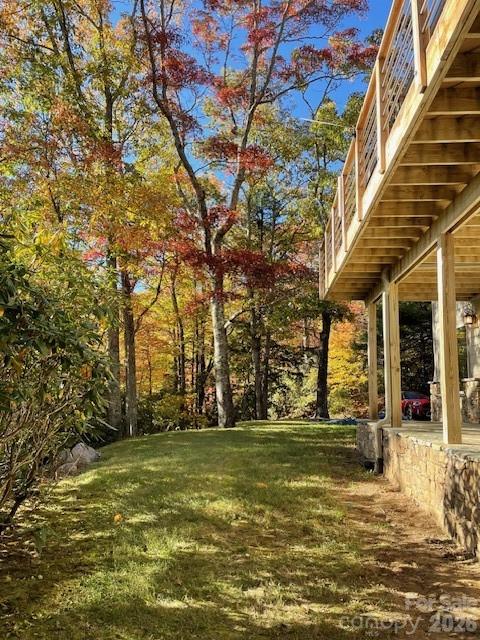 425 Flat Top Mountain Road Fairview, NC 28730 - Photo 44 of 48 a view of a house with a yard
