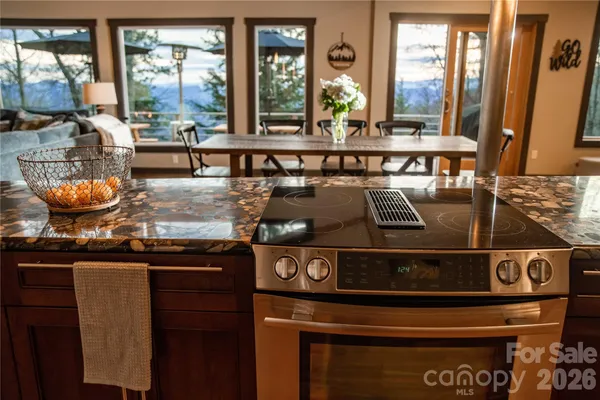 a kitchen with a stove and a microwave