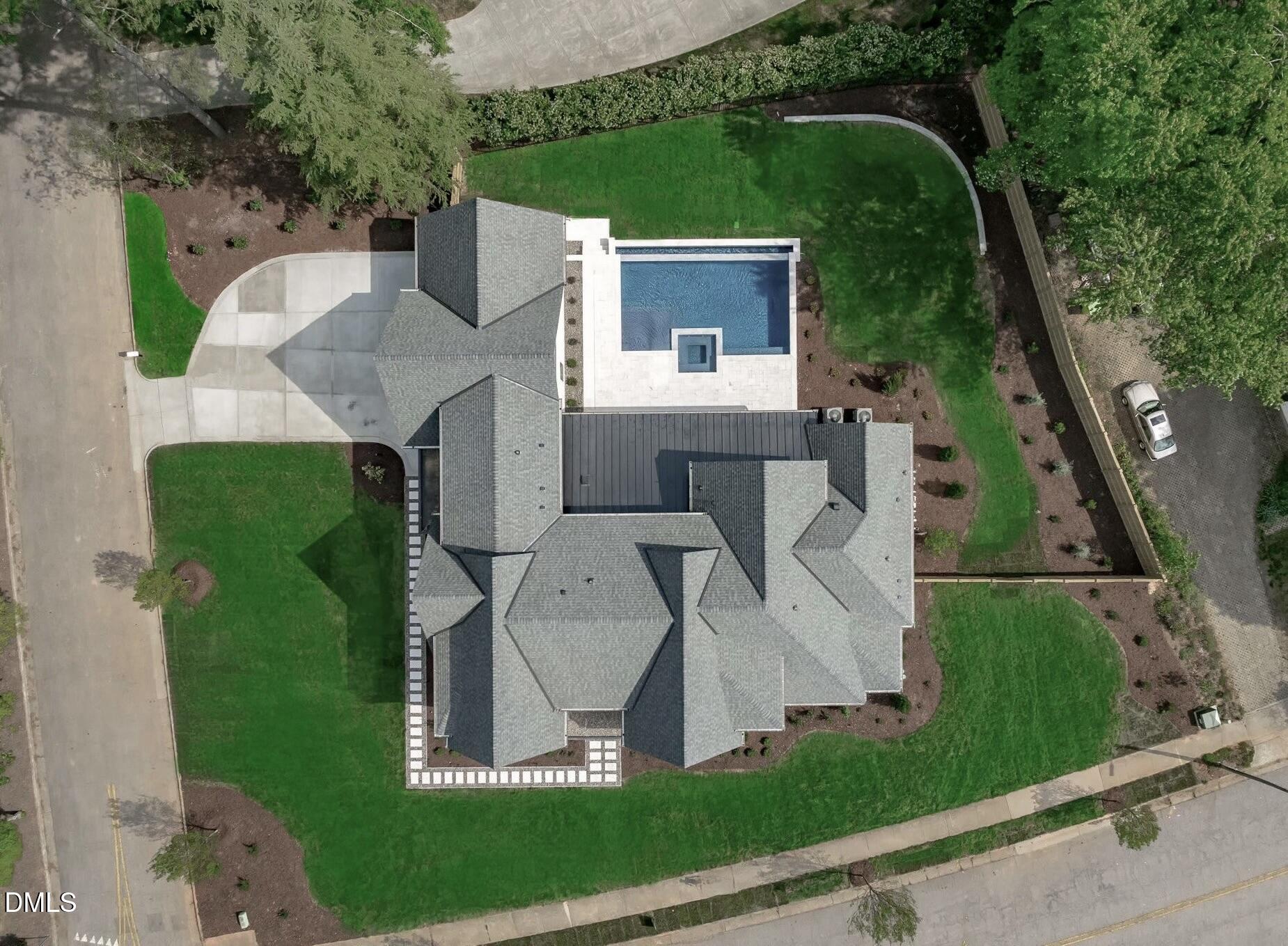 7917 South Bridgewater Court Raleigh, NC 27615 - Photo 67 of 67 an aerial view of a house with a yard