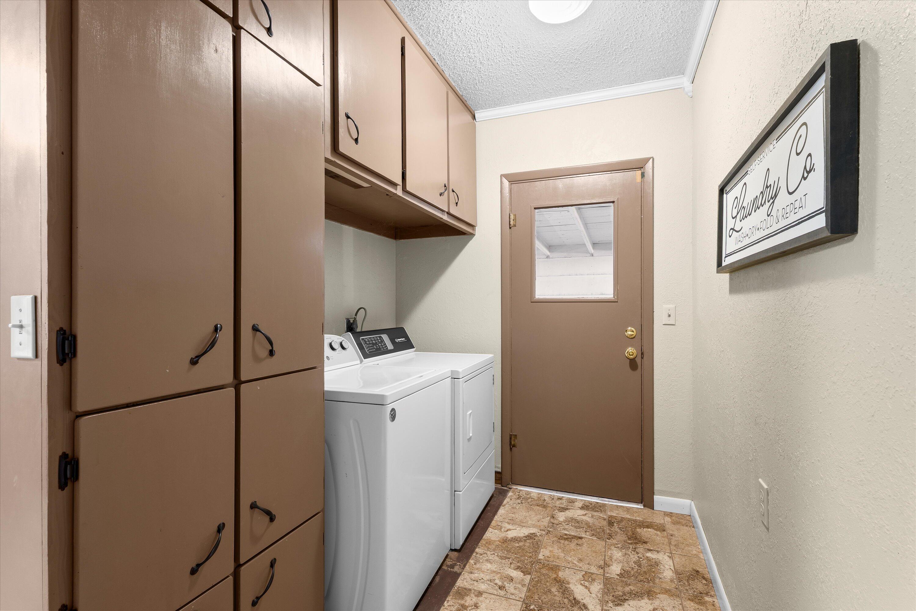 804 2nd Street Plains, TX 79355 - Photo 14 of 18 a room with storage and utility