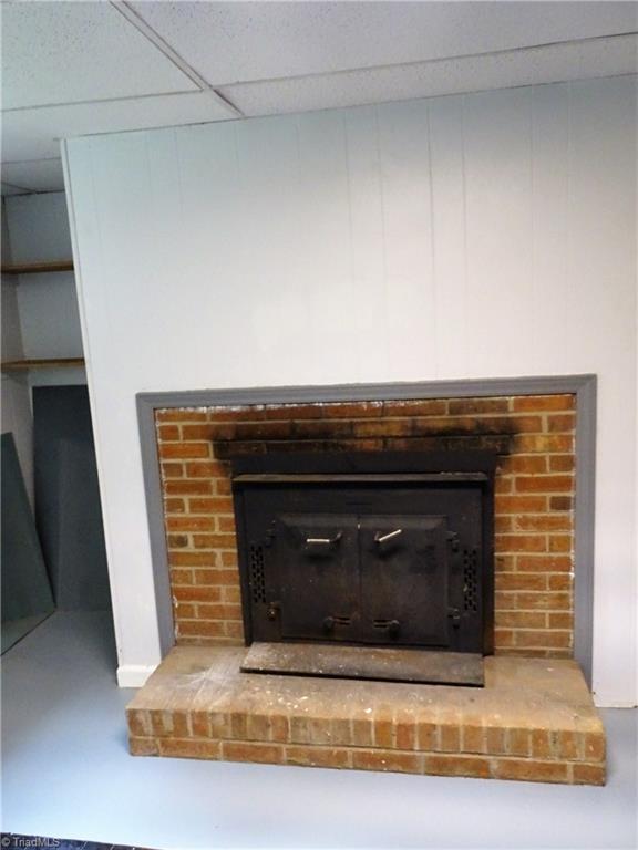 4596 Colonial Circle Trinity, NC 27370 - Photo 29 of 36 basement fireplace