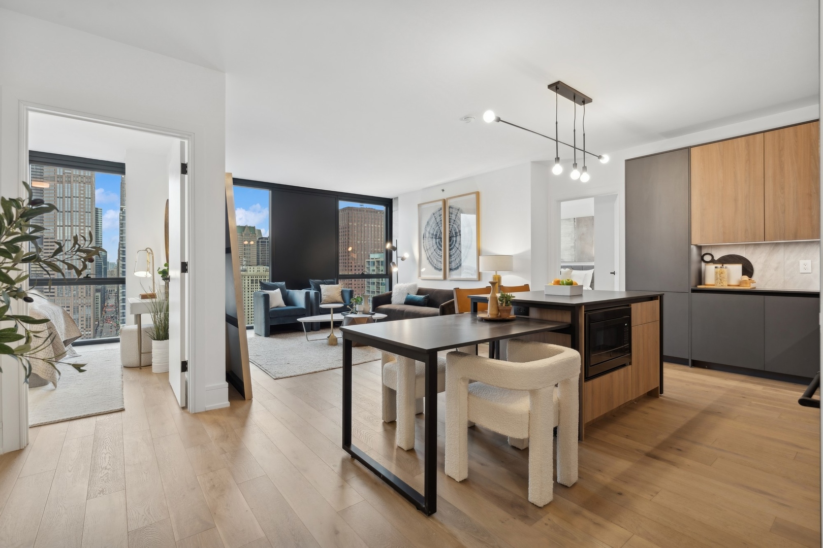 234 West Polk Street, Unit 3204 Chicago, IL 60607 - Photo 14 of 39 a kitchen with sink cabinets and wooden floor