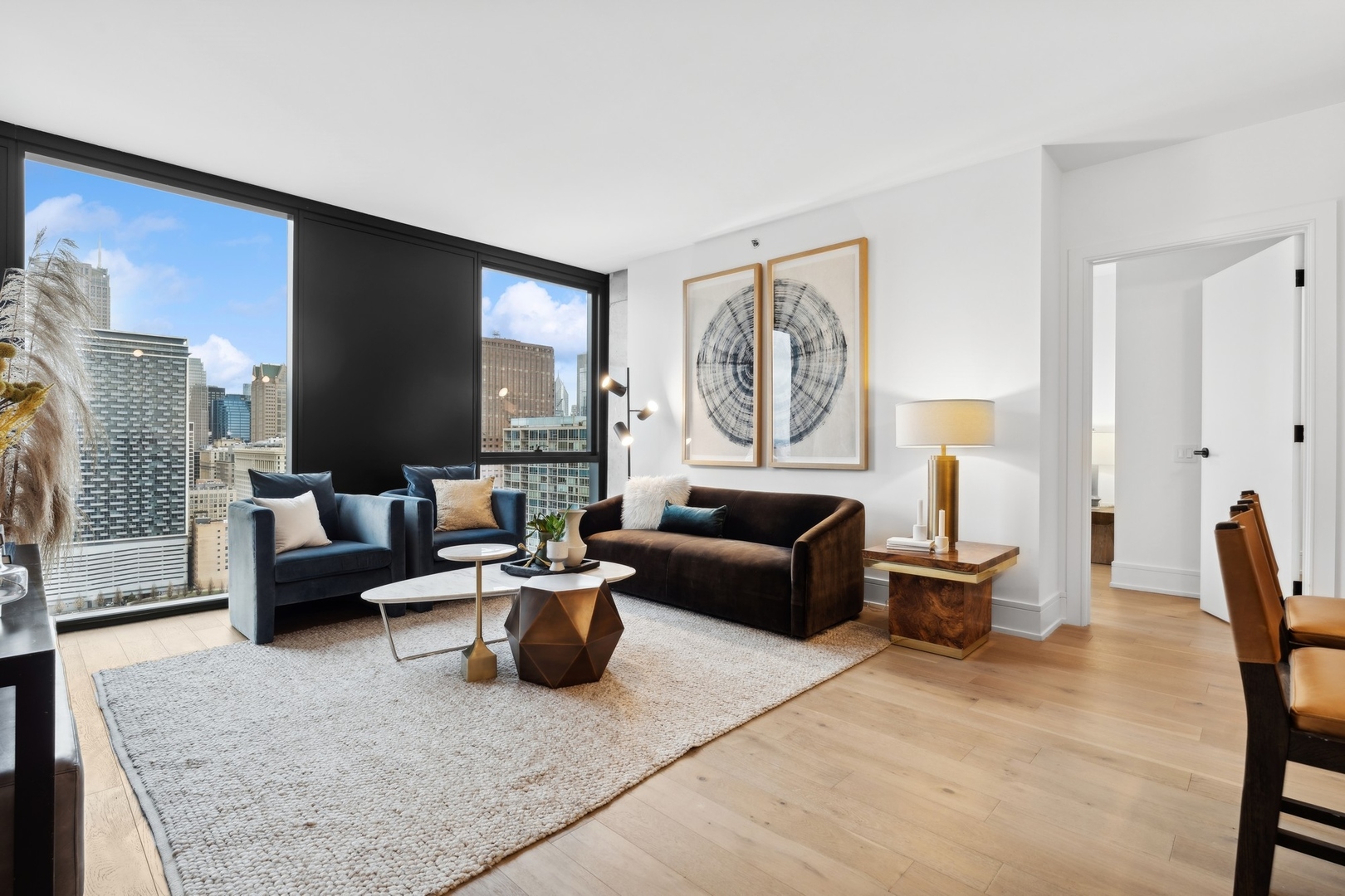 234 West Polk Street, Unit 3204 Chicago, IL 60607 - Photo 5 of 39 a living room with furniture and a couch