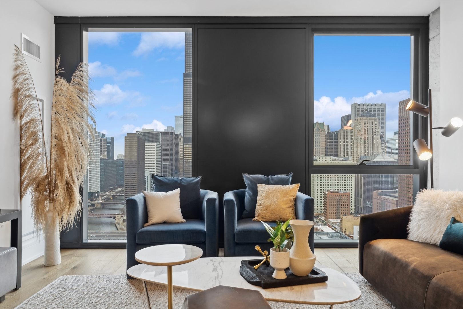 234 West Polk Street, Unit 3204 Chicago, IL 60607 - Photo 7 of 39 a living room with furniture and a large window