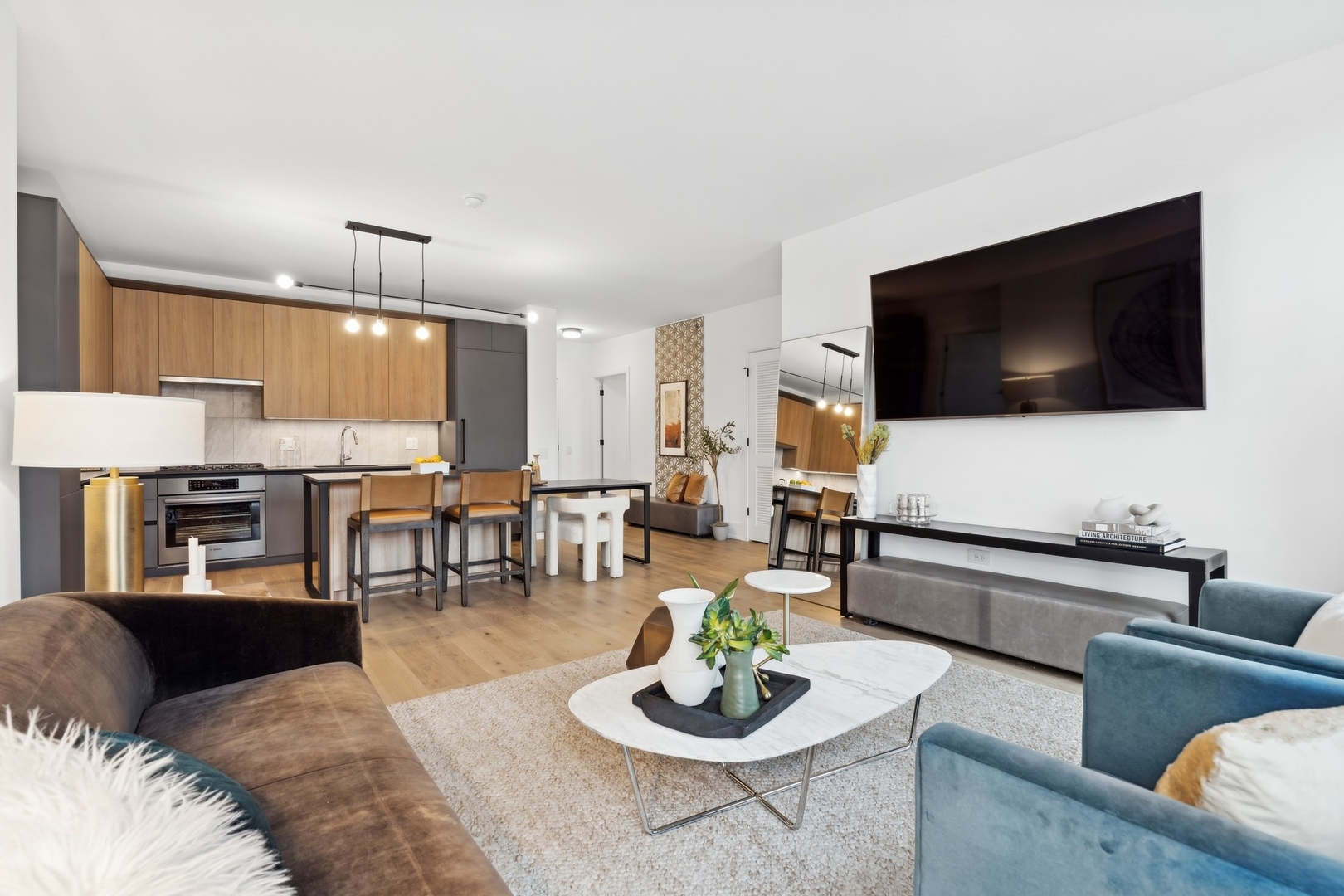234 West Polk Street, Unit 3204 Chicago, IL 60607 - Photo 10 of 39 a living room with furniture and a flat screen tv