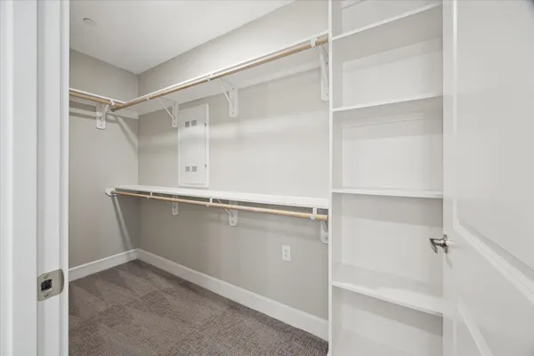 a view of an empty walk in closet