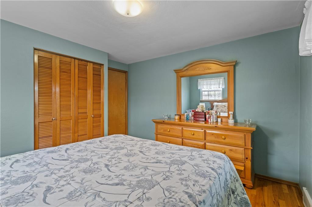 90 Davis Road Coraopolis, PA 15108 - Photo 12 of 29 a bedroom with a bed and a dresser