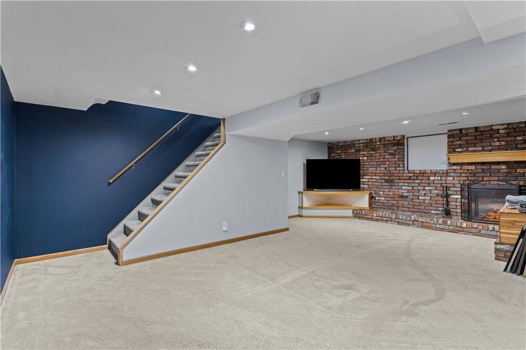 90 Davis Road Coraopolis, PA 15108 - Photo 18 of 29 an empty room with furniture and fireplace