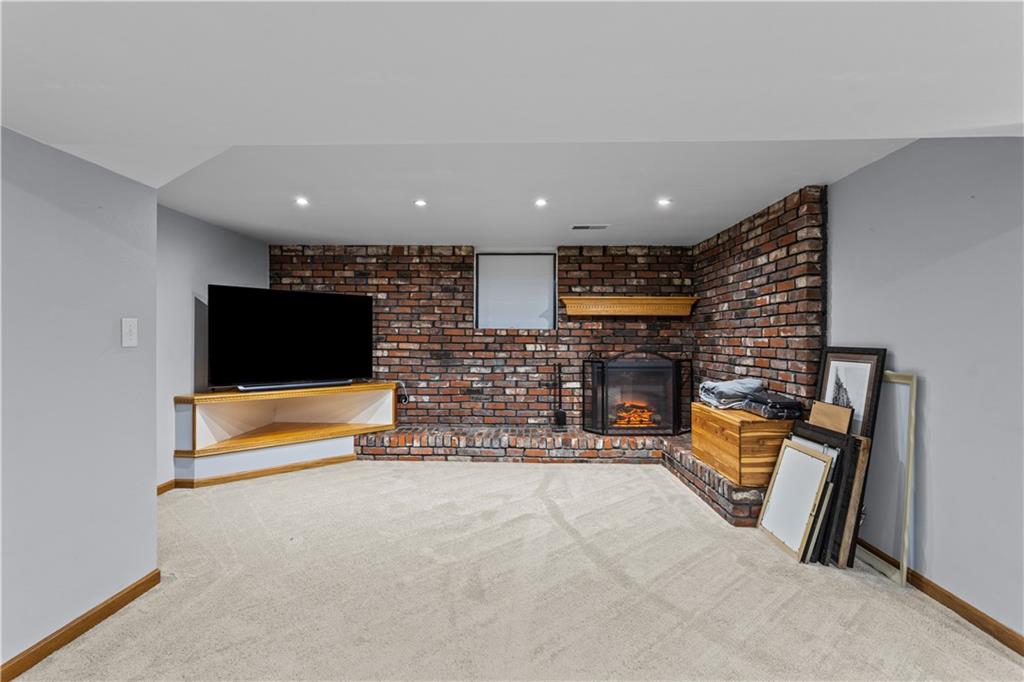 90 Davis Road Coraopolis, PA 15108 - Photo 19 of 29 an empty room with furniture and flat screen tv