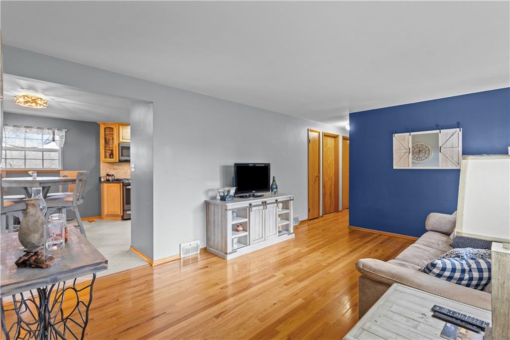 90 Davis Road Coraopolis, PA 15108 - Photo 2 of 29 a living room with furniture and a flat screen tv