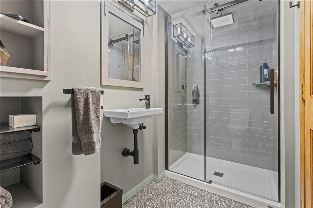 90 Davis Road Coraopolis, PA 15108 - Photo 22 of 29 a bathroom with a shower and a mirror