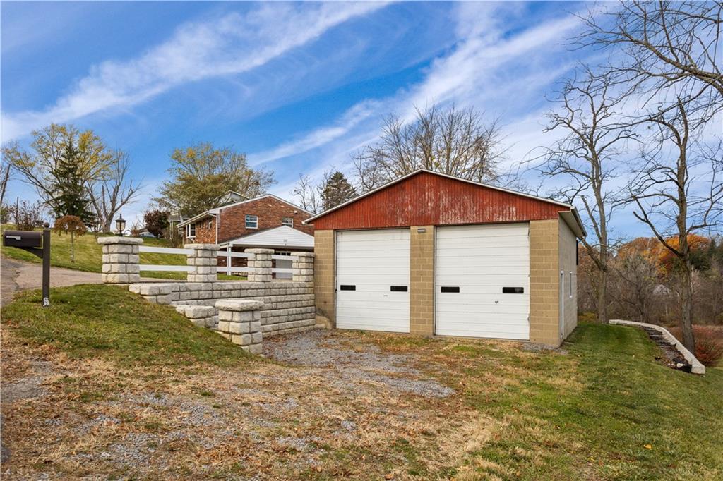 90 Davis Road Coraopolis, PA 15108 - Photo 27 of 29 a view of a house with a yard
