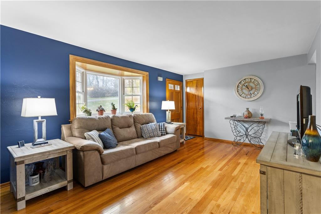 90 Davis Road Coraopolis, PA 15108 - Photo 3 of 29 a living room with furniture and a flat screen tv