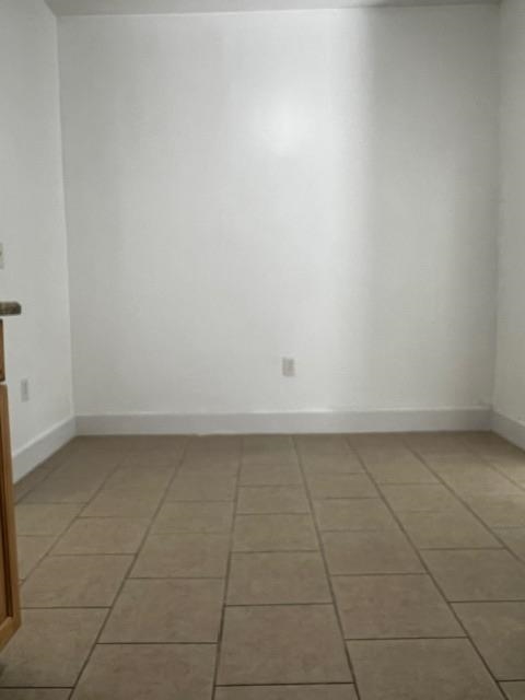331 79th Street, Unit 15 North Bergen, NJ 07047 - Photo 11 of 13 a view of a refrigerator in an empty room
