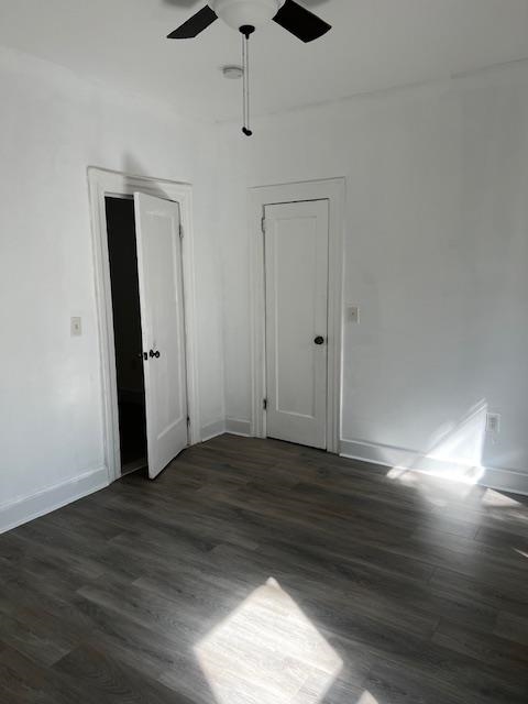 331 79th Street, Unit 15 North Bergen, NJ 07047 - Photo 13 of 13 an empty room with wooden floor and windows