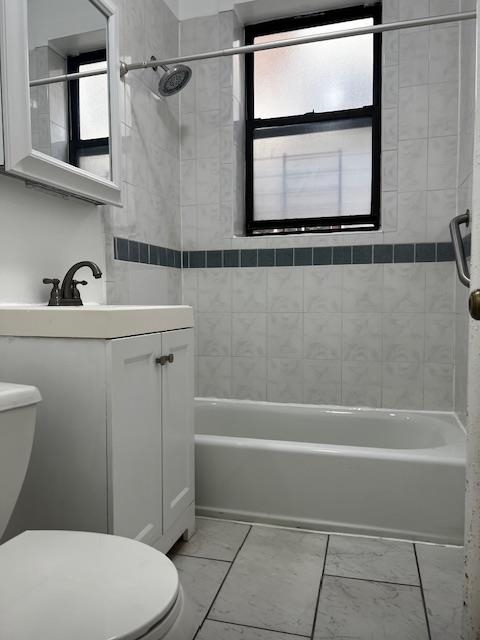 331 79th Street, Unit 15 North Bergen, NJ 07047 - Photo 8 of 13 a bathroom with a sink a toilet and a bathtub