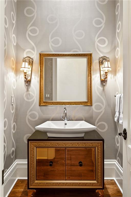 5148 Powers Ferry Road Northwest Sandy Springs, GA 30327 - Photo 18 of 63 a bathroom with a sink and a mirror