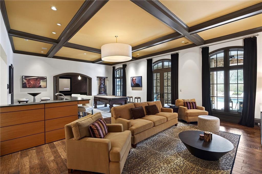 5148 Powers Ferry Road Northwest Sandy Springs, GA 30327 - Photo 35 of 63 a living room with furniture and a large window