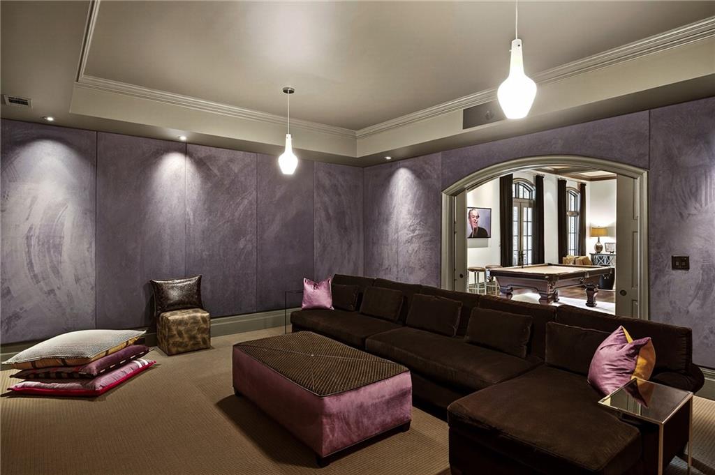 5148 Powers Ferry Road Northwest Sandy Springs, GA 30327 - Photo 41 of 63 a living room with furniture and a chandelier