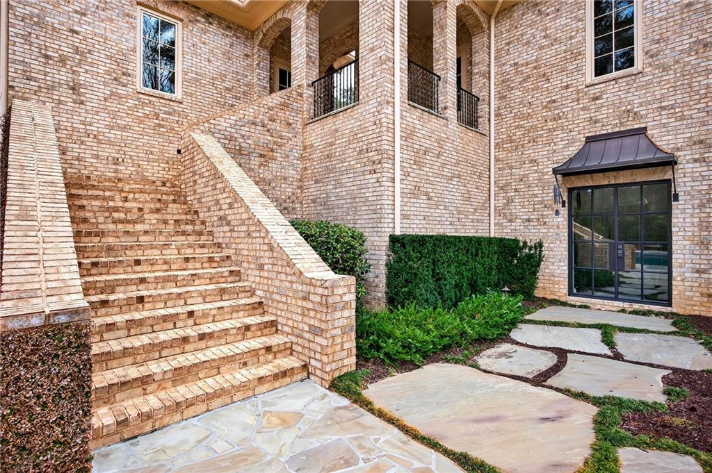 5148 Powers Ferry Road Northwest Sandy Springs, GA 30327 - Photo 49 of 63 a view of a brick building with many windows