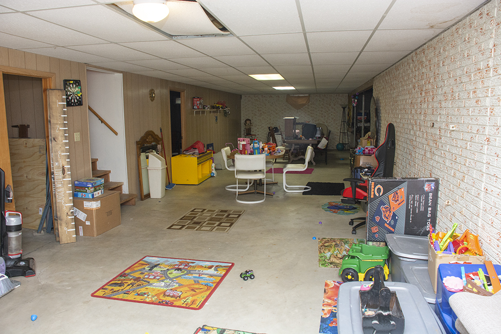 7849 Benson Road Lanark, IL 61046 - Photo 22 of 45 a view of a hallway with toys