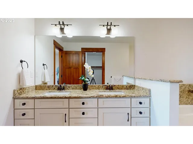 a bathroom with a sink tub and view