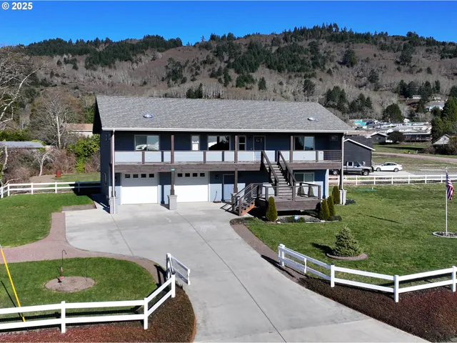 an aerial view of a house having yard